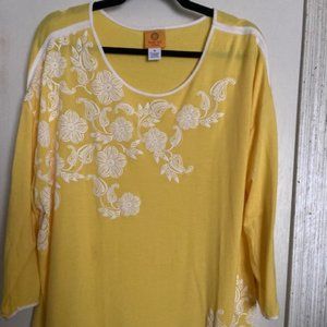 Yellow top with  white decoration flowers